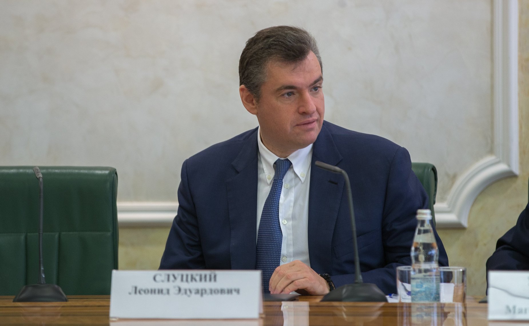 Л. Слуцкий