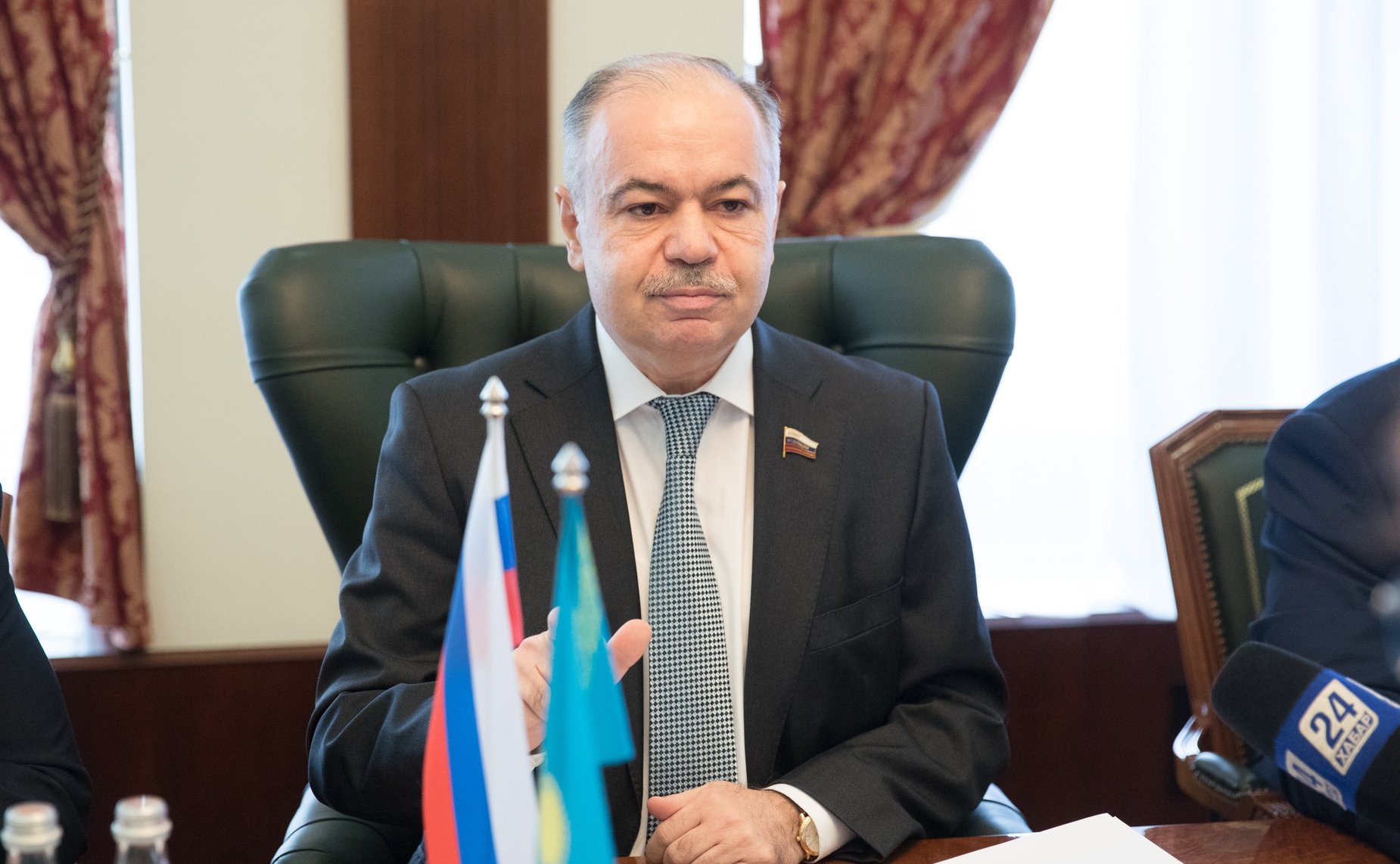 И. Умаханов