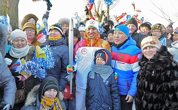 Бату Хасиков принял участие на этапе эстафеты Олимпийского огня в Калмыкии
