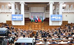 Vladimir Putin addresses the plenary session of the 10th BRICS Parliamentary Forum