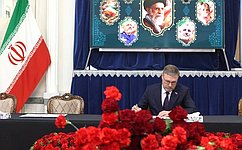 Konstantin Kosachev signs a condolence book at the residence of the Ambassador of the Islamic Republic of Iran in Moscow