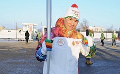 Б. Хасиков стал первым факелоносцем на этапе эстафеты Олимпийского огня в Калмыкии